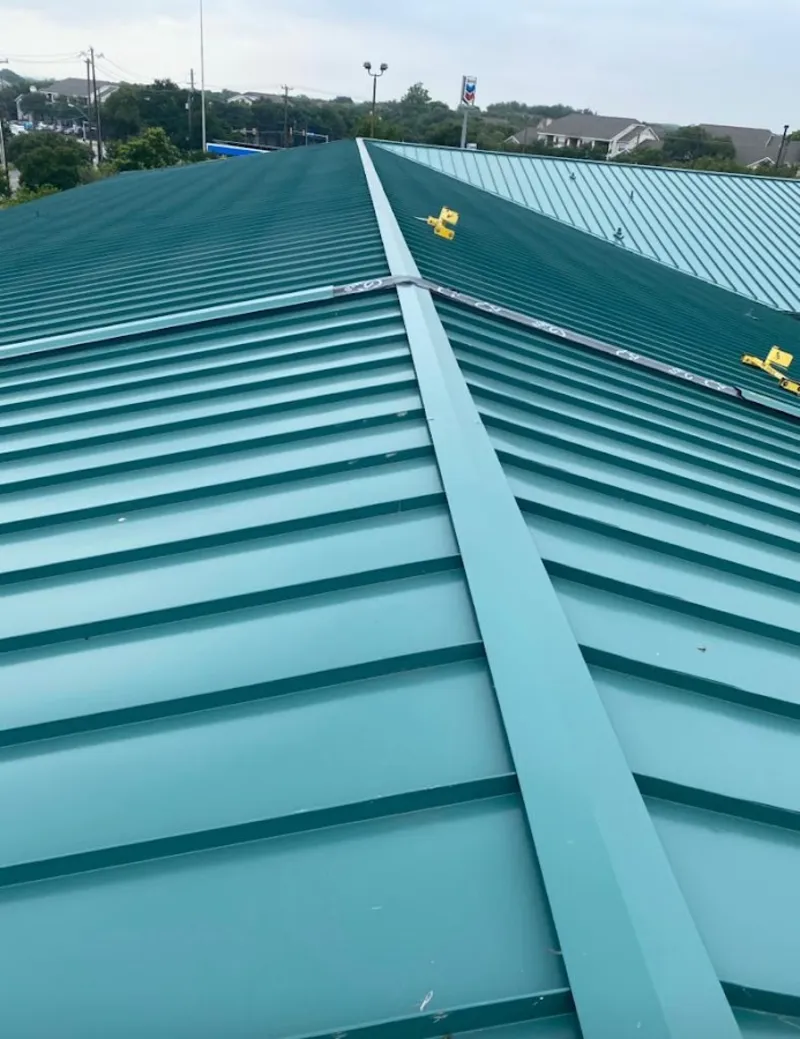 Green commercial metal roof ridge and valley for Metal Roof Repair in Angola